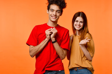 Fototapeta premium young couple in t-shirts chatting
