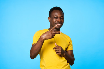 portrait of young man with ball on his head