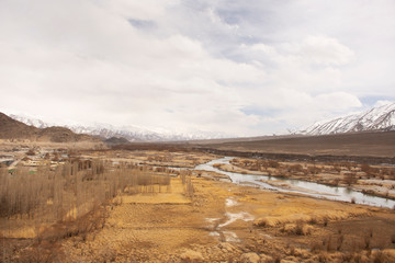 Viewpoint landscape of hight range mountain with Confluence of the Indus and Zanskar Rivers on Srinagar Leh Ladakh highway at Leh Ladakh village in Jammu and Kashmir, India at winter season
