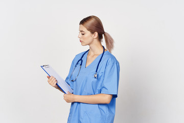 female doctor with clipboard