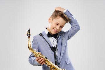 little boy with saxophone