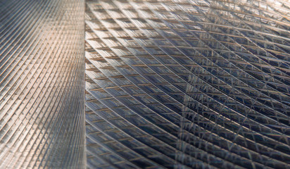 Industrial realistic gray color stainless steel flat part in partial focus after industrial CNC routing