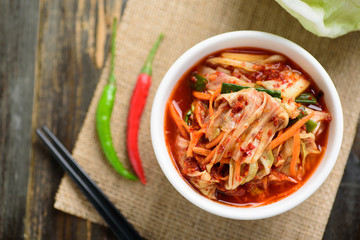 Kimchi cabbage in a bowl, Korean food, top view