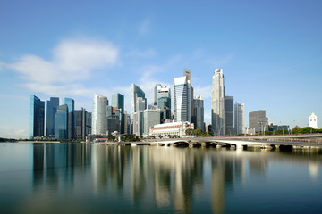 Fototapeta na wymiar Singapore business district skyline financial downtown building with tourist sightseeing in day at Marina Bay, Singapore. Asian tourism, modern city life, or business finance and economy concept