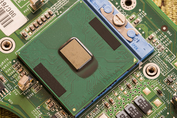 Processor on laptop motherboard in detail.