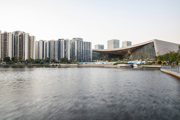 Fototapeta na wymiar Lake view residential building in Phoenix Lake Park, Nansha, Guangzhou, China