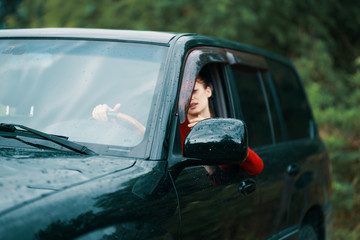 Obraz premium young woman in the car