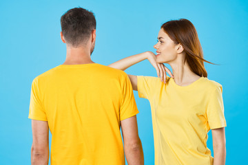 Fototapeta premium young couple in t-shirts chatting