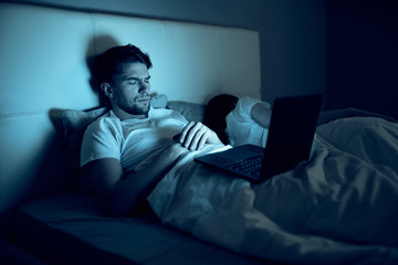 man watching tv in living room