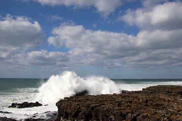 waves crashing on rocks