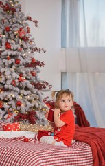 Children psychology. Little girl at Christmas cozy scene