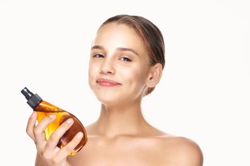 young woman with glass of orange juice