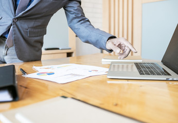 Concentrated Business man working at office on laptop computer at the office, consultant lawyer concept