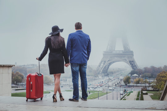 couple of tourists travel to Paris, romantic honeymoon trip, tourism in France