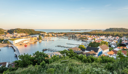 Mandal, a small city in the south of Norway. Seen from a height, with the sea and the sky in the background.