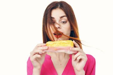 young woman eating pizza