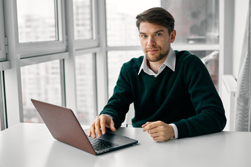 businessman working on laptop in office