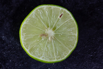 Lemon sliced black background