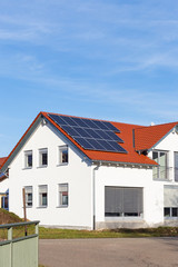 Fototapeta na wymiar solar panels on a rooftop of a new building