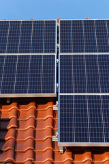 solar panels on a rooftop of a new building