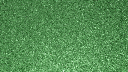 Green glitter texture background for Christmas and Saint Patrick’s day holiday decoration...