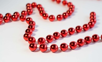 red beads on white background Wallpaper