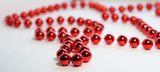 red beads on white background Wallpaper