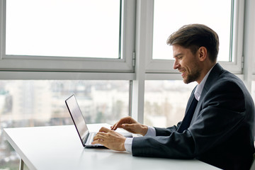 businessman working on his laptop in office