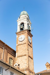 Fototapeta na wymiar bell tower of the St Michael the Archangel parish church in Belgioioso city, Province of Pavia, Lombardy, Italy