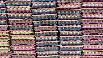 Organic fresh eggs in colorful cardboard egg box holder at the supermarket in Istanbul, Turkey
