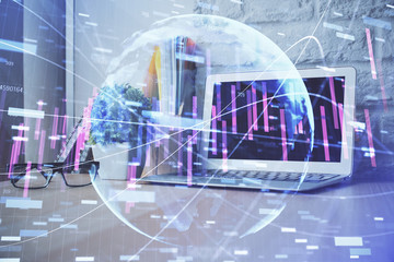 Forex market graph hologram and personal computer on background. Double exposure. Concept of investment.