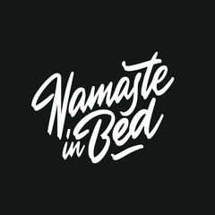Inscription: Namaste in bed, hand-drawing of ink on a black background. Funny phrase. It can be used for card, mug, brochures, poster, t-shirts, phone case etc.