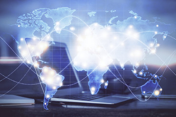 Multi exposure of business theme icons and work space with computer background. Concept of success.