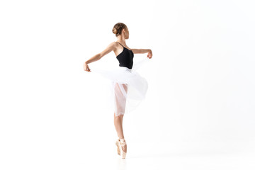 young ballet dancer in action isolated on white © SHOTPRIME STUDIO