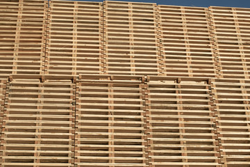 Piles of euro type cargo pallets, transportation, wooden wallpaper
