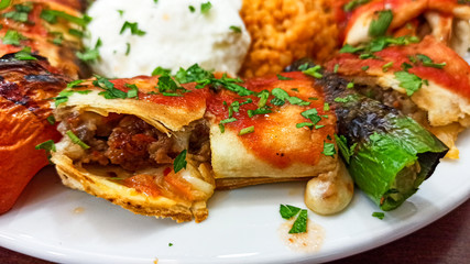 Traditional Turkish Food Beyti Kebab with rice and yogurt in Turkey