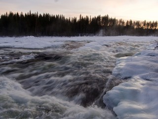 winter landscape, waterfall Storforsen in the North