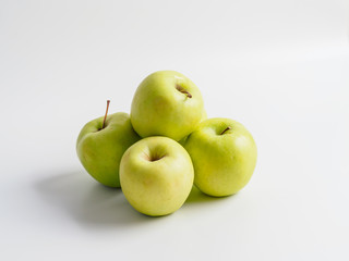 Organic green apples isolated on white background.