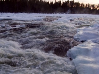 winter landscape, waterfall Storforsen in the North