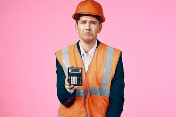 construction worker with calculator