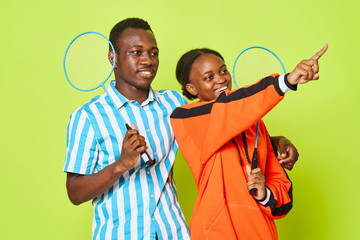 man and woman playing table tennis