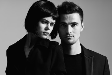 portrait of young man and woman