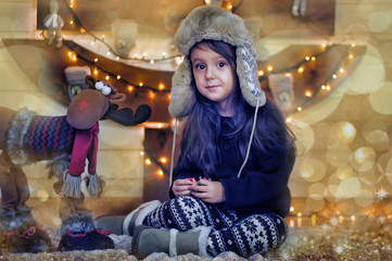 Little girl in a cap. Caucasian, expressive.