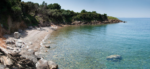 Secluded rocky beach in Sithonia, Halkidiki, Greece