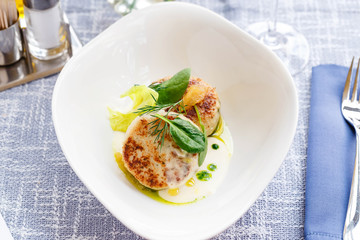 Fish cutlets in restaurant serving