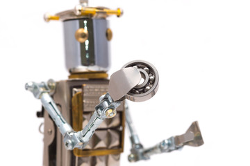 Steampunk robot holding bearing. Cyberpunk style. Chrome and bronze parts.