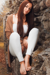 A beautiful barefoot girl outdoors