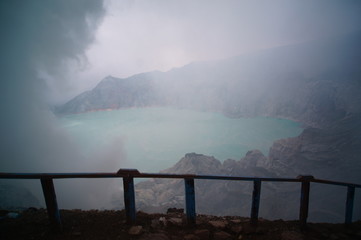 Fototapeta premium Ijen Crater is a acidic crater lake located at the top of Mount Ijen with a lake depth of 200 meters and the area of ​​the crater reaching 5,466 hectares.