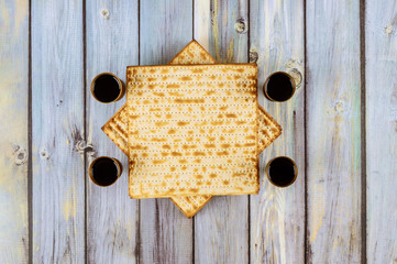 Pesah holiday celebration, matza unleavened bread and four cup kosher wine