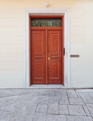 Fototapeta na wymiar house entrance solid wood door, Athens Greece, Plaka neighborhood